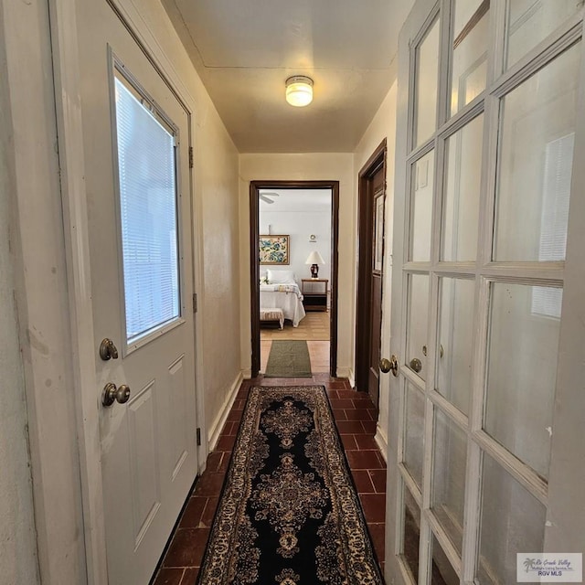 entryway with brick floor