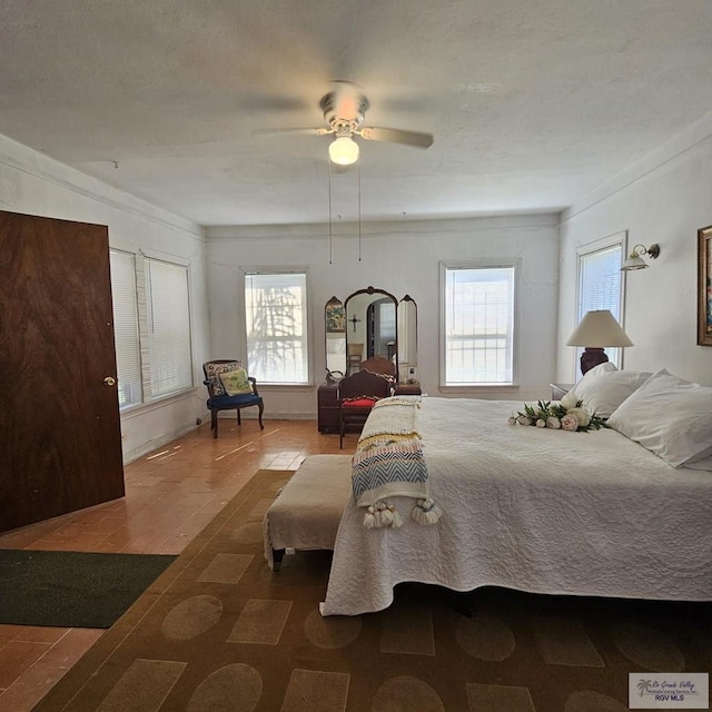 bedroom featuring ceiling fan