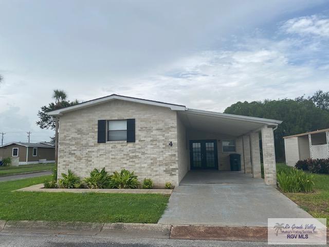 view of front of property with a front lawn