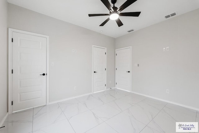 empty room featuring ceiling fan