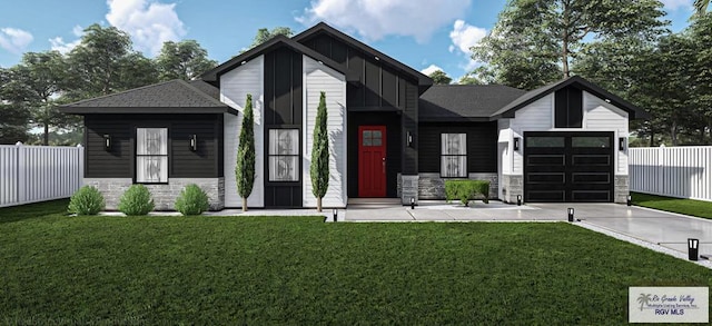 view of front facade featuring a garage and a front yard