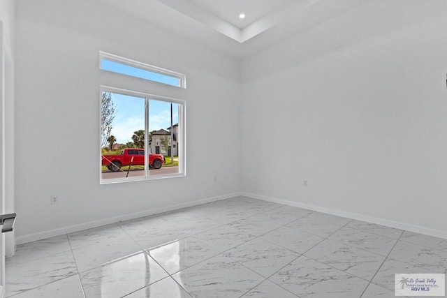 7332 San Andres St, Brownsville, TX 78520 - empty room featuring marble finish flooring, baseboards, and recessed lighting