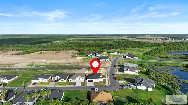 7332 San Andres St, Brownsville, TX 78520 - aerial view of property's location featuring a large body of water and nearby suburban area