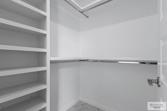 7332 San Andres St, Brownsville, TX 78520 - spacious closet featuring marble finish floors