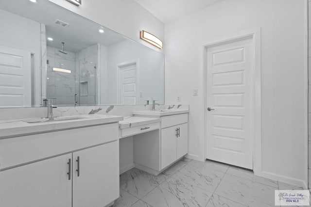 7332 San Andres St, Brownsville, TX 78520 - bathroom with a marble finish shower, vanity, baseboards, marble look tiles, and recessed lighting