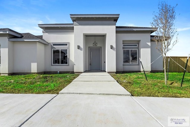 7332 San Andres St, Brownsville, TX 78520 - view of front facade with stucco siding