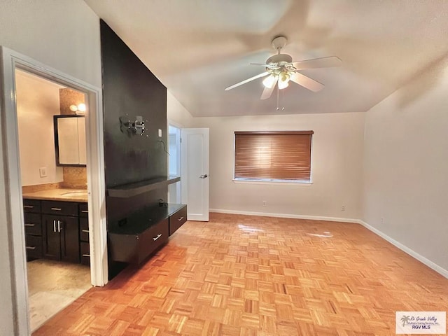 2901 Central Blvd Unit 306, Brownsville, TX 78520 - unfurnished living room with ceiling fan and baseboards