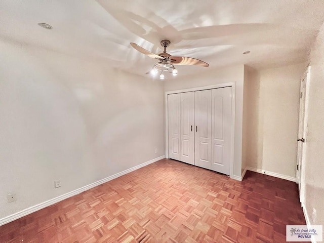 2901 Central Blvd Unit 306, Brownsville, TX 78520 - unfurnished bedroom with baseboards, a closet, and a ceiling fan