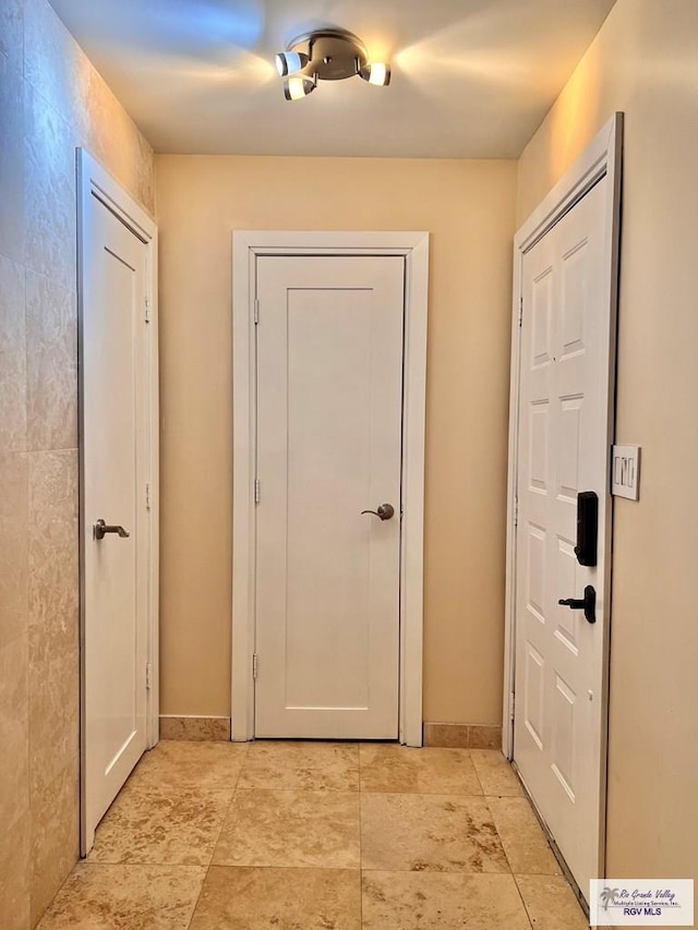 2901 Central Blvd Unit 306, Brownsville, TX 78520 - corridor with baseboards