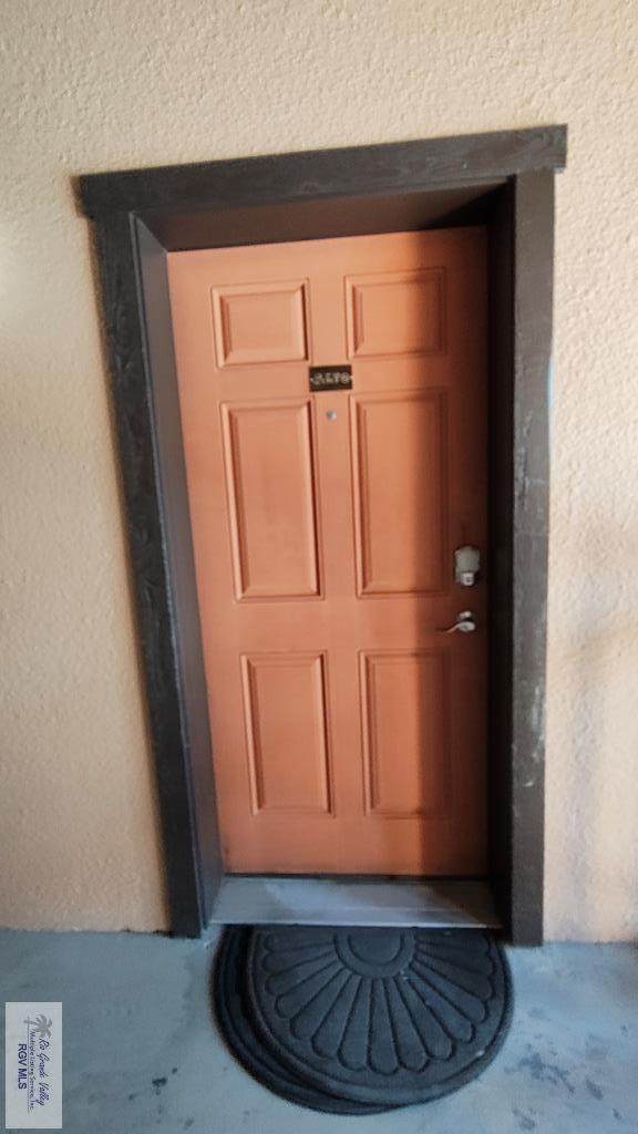 6608 Padre Blvd Unit D-253, South Padre Island, TX 78597 - doorway to property with stucco siding