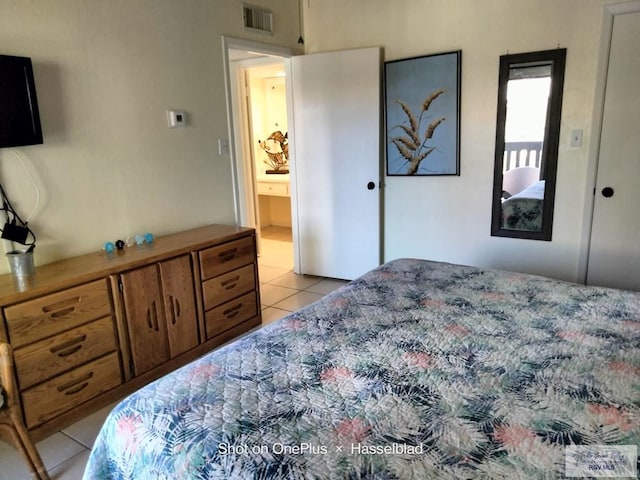 6608 Padre Blvd Unit D-253, South Padre Island, TX 78597 - bedroom with light tile patterned flooring