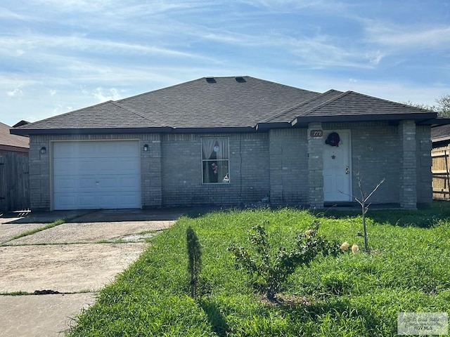 single story home with a garage