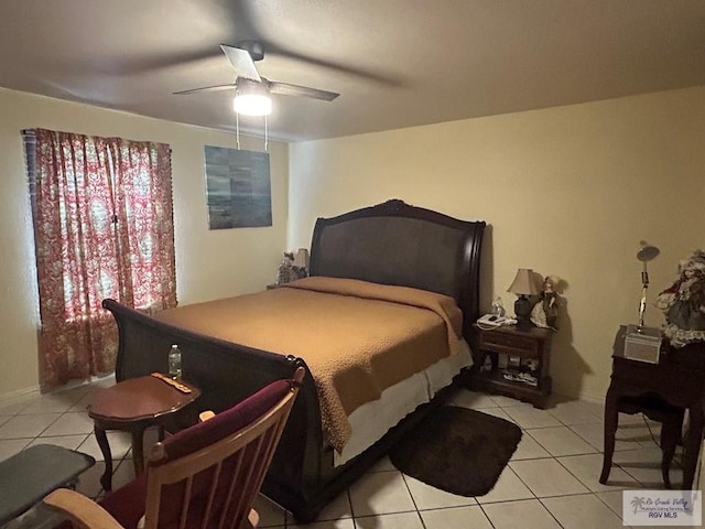 bedroom with light tile patterned floors and ceiling fan