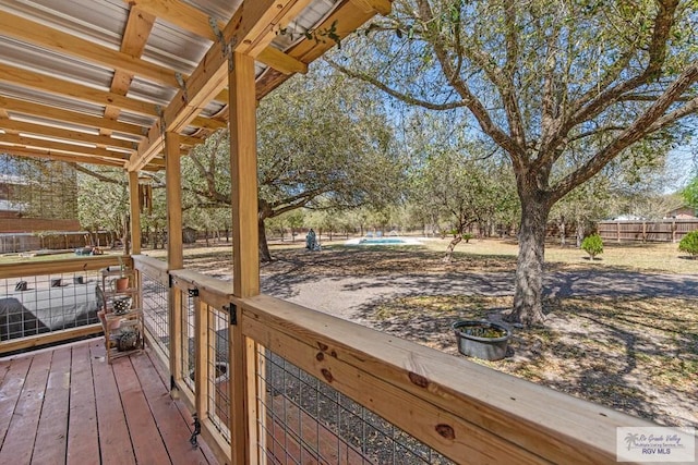 wooden deck featuring fence