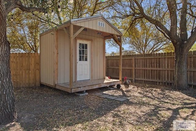 view of shed featuring a fenced backyard