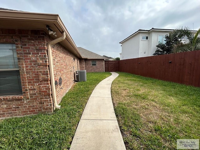 view of yard featuring central AC