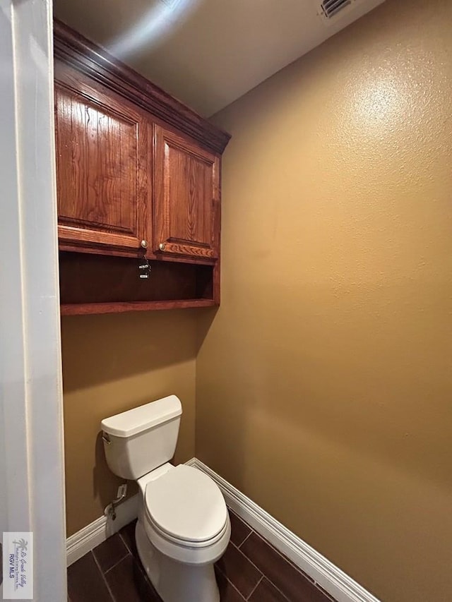 bathroom featuring toilet