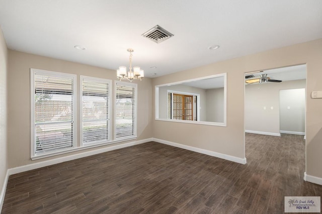 716 E Palm Valley Dr, Harlingen, TX 78550 - empty room with a chandelier, dark wood-style flooring, ceiling fan, and recessed lighting