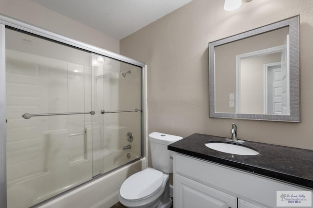 716 E Palm Valley Dr, Harlingen, TX 78550 - full bathroom featuring vanity and enclosed tub / shower combo