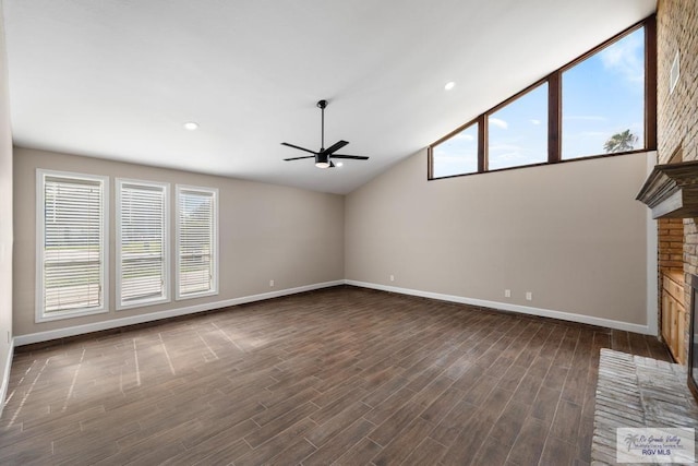 716 E Palm Valley Dr, Harlingen, TX 78550 - unfurnished living room featuring ceiling fan, plenty of natural light, dark wood-type flooring, vaulted ceiling, and recessed lighting