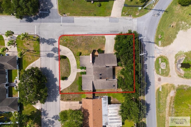 716 E Palm Valley Dr, Harlingen, TX 78550 - aerial view of property and surrounding area with property boundaries highlighted
