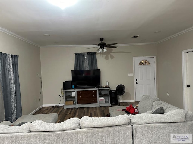 living room with crown molding, ceiling fan, and dark hardwood / wood-style floors