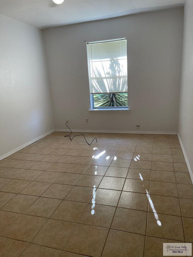 view of tiled spare room