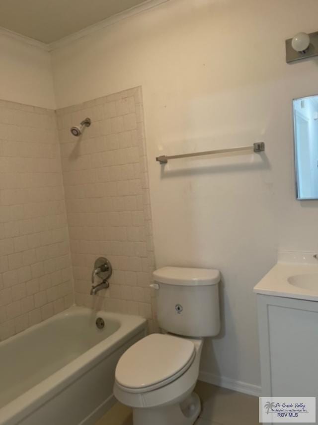 full bathroom with tiled shower / bath combo, toilet, crown molding, and vanity