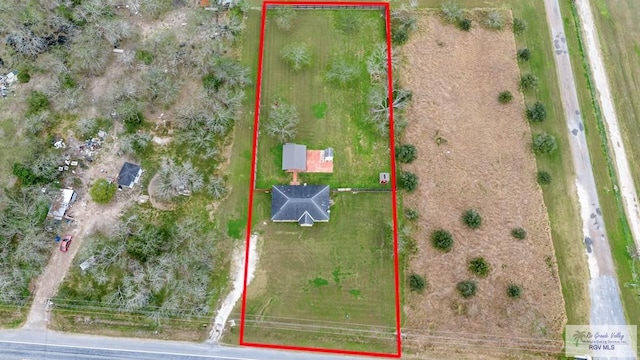 birds eye view of property featuring a rural view