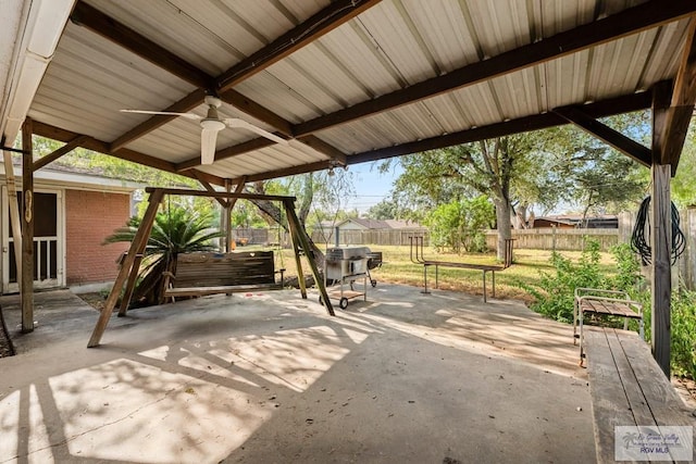 view of patio featuring ceiling fan