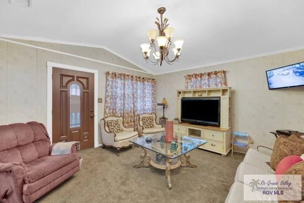 living area featuring carpet, visible vents, an inviting chandelier, ornamental molding, and vaulted ceiling