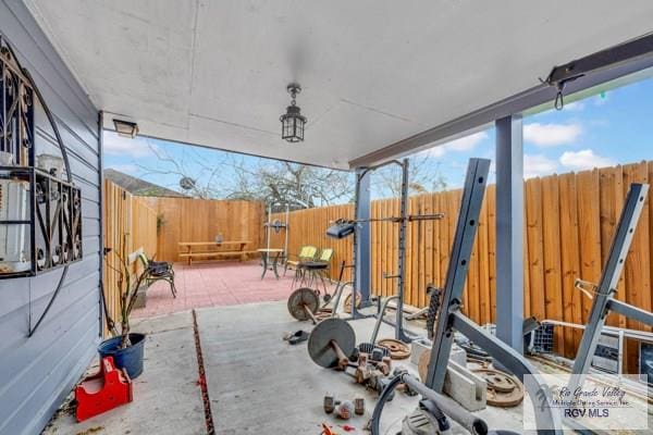 exercise area featuring floor to ceiling windows