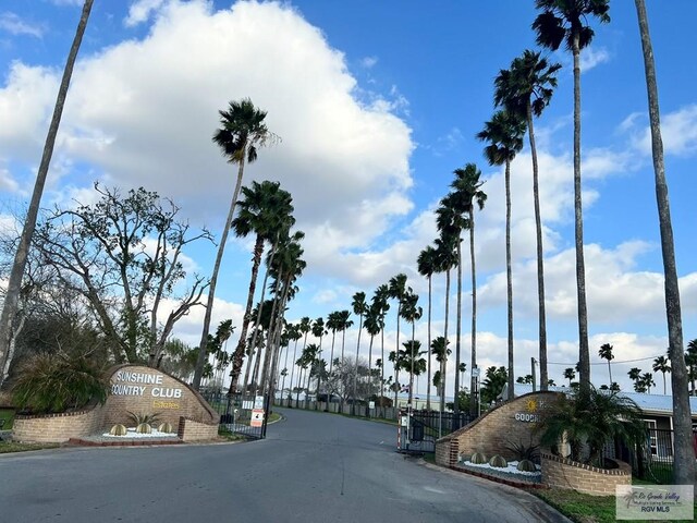 view of street featuring a gated entry