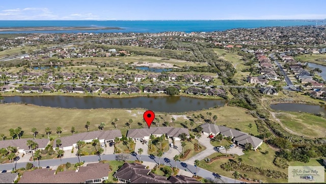 aerial view with a water view and a residential view