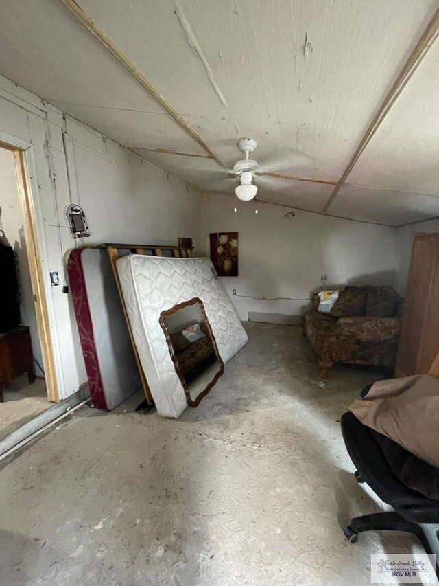 23362 Fm 506, Santa Rosa, TX 78593 - living area with unfinished concrete flooring and a ceiling fan
