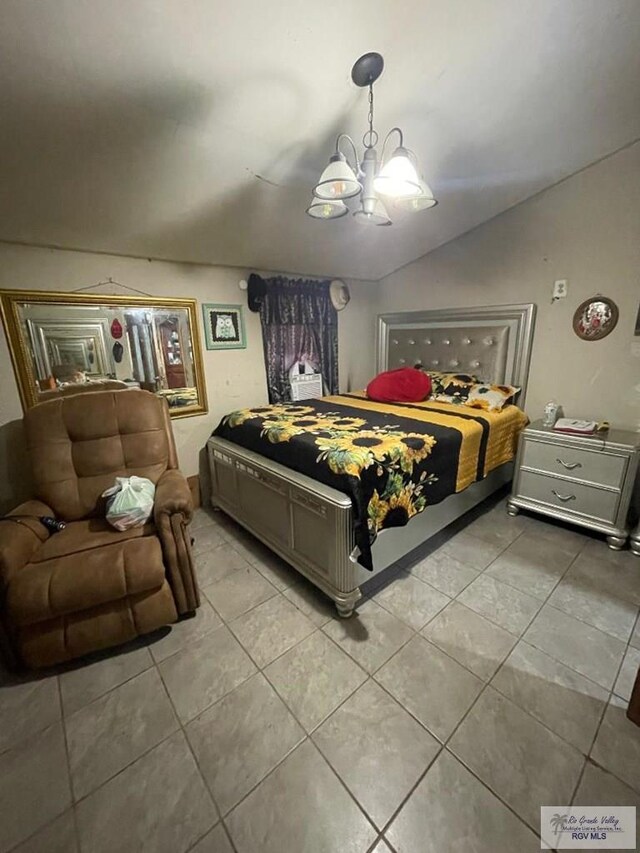 23362 Fm 506, Santa Rosa, TX 78593 - bedroom with light tile patterned flooring, a chandelier, and vaulted ceiling