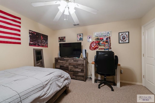 bedroom featuring ceiling fan and carpet flooring