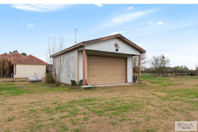 garage with a yard