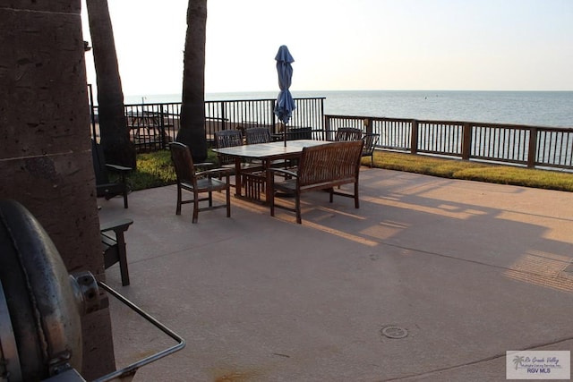 view of patio / terrace featuring a water view