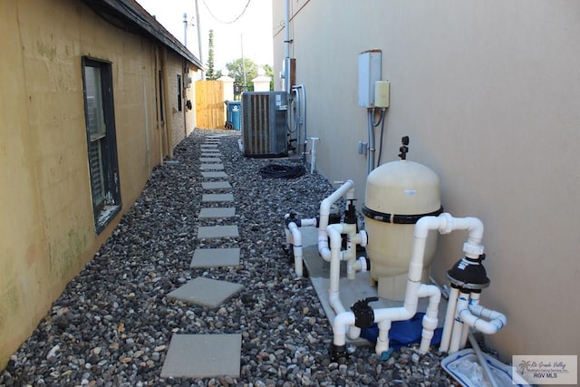 view of yard with central AC unit