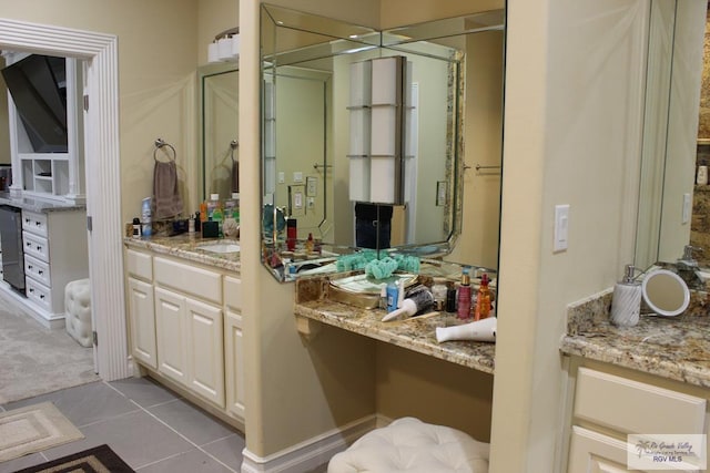 bathroom with vanity and tile patterned floors