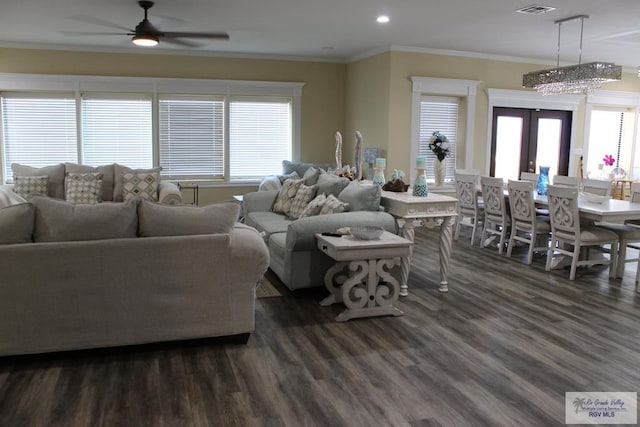 living room featuring ceiling fan, dark hardwood / wood-style flooring, ornamental molding, and french doors