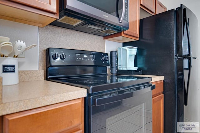 kitchen with black appliances