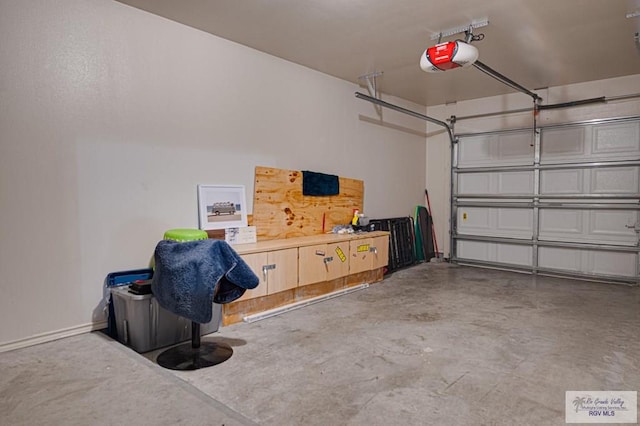 garage featuring a garage door opener