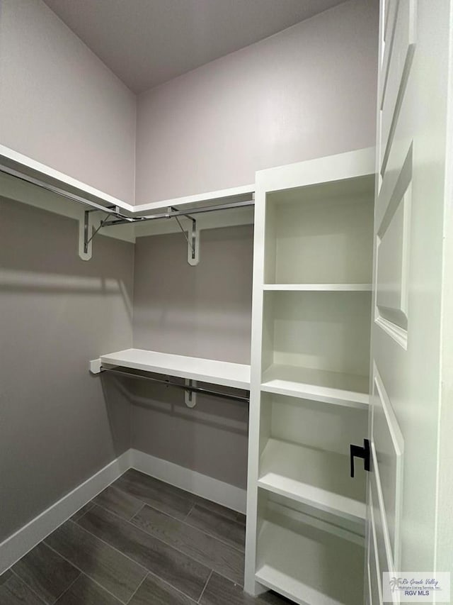3406 Kelsey Ct, Harlingen, TX 78550 - spacious closet featuring wood finish floors