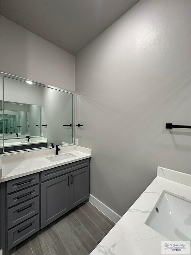 3406 Kelsey Ct, Harlingen, TX 78550 - full bath featuring vanity and wood finish floors