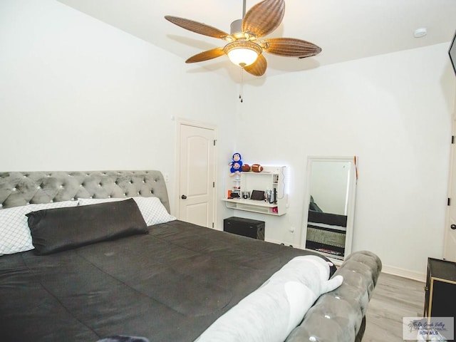 bedroom featuring ceiling fan and light wood-type flooring