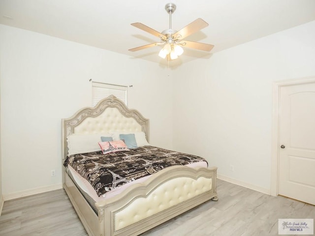 bedroom featuring ceiling fan and light wood-type flooring