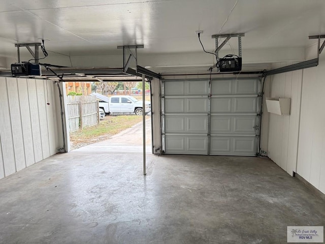 garage featuring a garage door opener