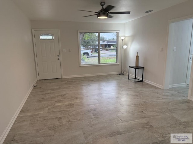 entrance foyer featuring ceiling fan